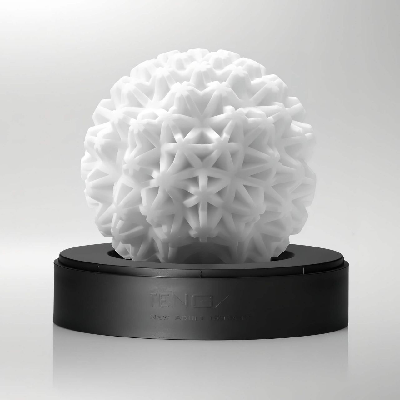 TENGA GEO - csillag mintás maszturbátor (Coral) TENGA GEO - csillag mintás maszturbátor (Coral)